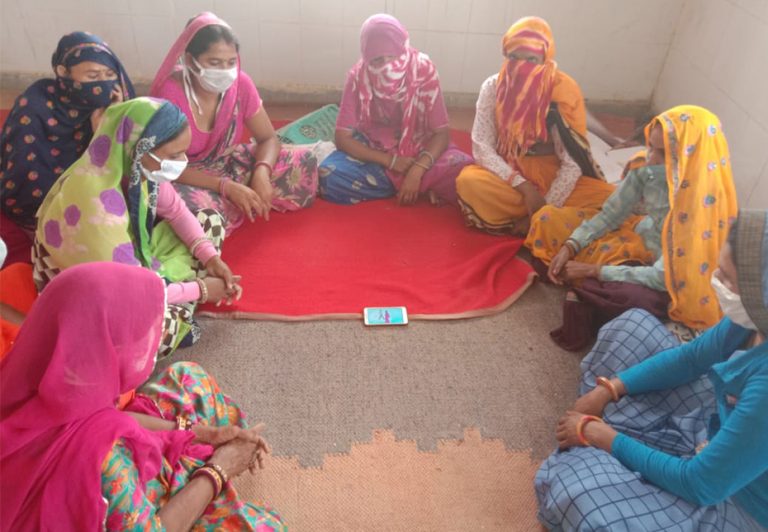 Group Of Village Women Attending Group Of Village Women Attending A Virtual Training Session Training Session